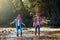 Another day, another adventure. Shot of two young girls playing in a river.