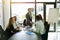 Another successful business negotiation. colleagues shaking hands during a formal meeting in an office.