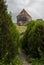 Another view of the belltower and the Church of Sourb Nshan, Armenia