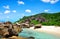 Anse Marron beach with big granite boulders on La Digue Island, Seychelles.