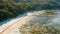 Anse Source D`argent Aerial view 4k flight above tropical beach on La Digue island, Seychelles. Tranquil scene at early