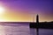 Anstruther harbour and lighthouse at sunset, fife, scotland.