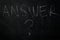 answer ? - the word answer handwritten with chalk on a blackboard with question mark