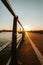 Ant view image of the path in the docks of vigo during a burning sunset