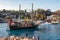 ANTALYA, TURKEY - JULY 08, 2018: Wooden cruise ship in the old city marina Roman harbor of Antalya. Boating is a very popular