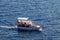 ANTALYA, TURKEY - JULY 08, 2018: Wooden motor cruise ship in the Mediterranean Sea near the coast of Antalya. Boating is a very