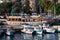 ANTALYA, TURKEY - JULY 08, 2018: Wooden ship waiting for a cruise in the Mediterranean Sea in the old city marina Roman harbor.