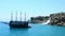 Antalya, Turkey - July 4, 2018: ship and mountains waterfall