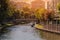 Antalya, Turkey - July 5, 2022: Touristic boat and gondola on the Porsuk River passing through the city center of Eskisehir