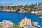 ANTALYA, TURKEY - MAY 21, 2017: Panoramic view on Old marina - most popular tourist place, cozy cafes, luxury restaurants, green