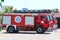 Antalya, Turkey - May 26 2017: Three red firetruck with rescue ladder standing on the street of the city near firehouse.