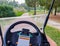 Antalya, Turkey, November 2019: View from the Golf car: the steering wheel with a Notepad for recording points for goals scored,