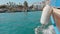 Antalya, Turkey - October 30, 2019: sea boat arriving in city port after cruise. Sailing boat board with white buoy on