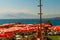 ANTALYA, TURKEY: Red umbrellas on Adalar Beach in the rocks in Karaalioglu Park Antalya