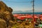 ANTALYA, TURKEY: Red umbrellas on Adalar Beach in the rocks in Karaalioglu Park Antalya