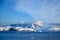 Antarctic landscape with snowcapped mountains and glacier near Andvor Bay, Antactic Peninsular