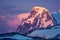 Antarctic mountain on the colorful sky background.