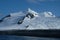 Antarctica hiking beneath pristine mountains, snow and glaciers