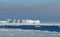 Antarctica ice cold icebergs sea and blue sky