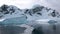 Antarctica. Icebergs. Global warming. Summer Midnight Sun and icebergs. Big blue ice in icefjord. Affected by climate