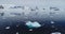 Antarctica icebergs at ocean water aerial. Climate change, global warming concept. Nature seascape