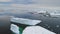 Antarctica iecberg float ocean open water aerial