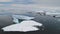 Antarctica iecberg float ocean open water aerial