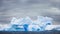 Antarctica Nature. Blue glacier iceberg with cave