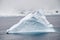 Antarctica - Non-Tabular Iceberg Drifting In The Ocean