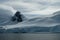 Antarctica smooth snowy mountains on cloudy day