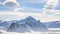 Antarctica. Snow-capped mountain against blue sky