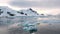 Antarctica. Snowy mountains and icebergs. Cruise Travel to the Edge of the Earth. Amazing beautiful views of Nature and