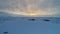 Antarctica sunrise sky over glacier aerial view