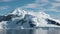 Antarkeic landscape with snowy mountains, glaciers and icebergs. Landscape of icy shores in Antarctica. Beautiful blue