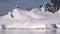 Antarkeic landscape with snowy mountains, glaciers and icebergs. Landscape of icy shores in Antarctica. Beautiful blue