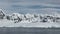 Antarkeic landscape with snowy mountains, glaciers and icebergs. Landscape of icy shores in Antarctica. Beautiful blue