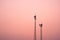 Antenna broadcast signal telecommunication in an pink orange sky background