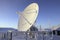 Antenna covered by hoarfrost against blue sky