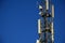 A antenna mast Telekommunikation with blue sky backgound