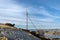 Antenna post on top of a hill in Tananger suburb and Hafsfjord fjord view on background