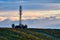 The antenna of the repeater on the background of the dawn sky and the autumn vineyards.South Moravia.Czech republic.