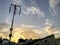 Antennas on the roofs of the village houses at dusk