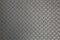 Anti slip gray metal plate with diamond pattern