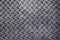 Anti slip gray metal plate with diamond pattern