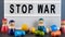 Anti-war concept. Stop war inscription and wooden figurines. Combat casualties. Video 4k