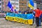 Anti-war protest demonstration against the Russian invasion of Ukraine with Ukrainian symbols on Central Square of Munich