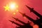 Antiaircraft rockets silhouettes on background of China flag.