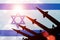Antiaircraft rockets silhouettes on background of Israel flag.