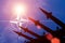 Antiaircraft rockets silhouettes on background of NATO