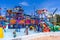 Antibes, France 26.07.2020 Water park, slides near the pool, summer holidays. Children having fun on water slide
